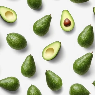 A variety of green avocados in different shapes and sizes isolated on a white background.