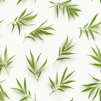 Seamless pattern of green bamboo leaves on a white background.