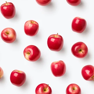 A clean, crisp, monochromatic pattern featuring fresh red apples arranged in a repetitive pattern on a pristine white background.